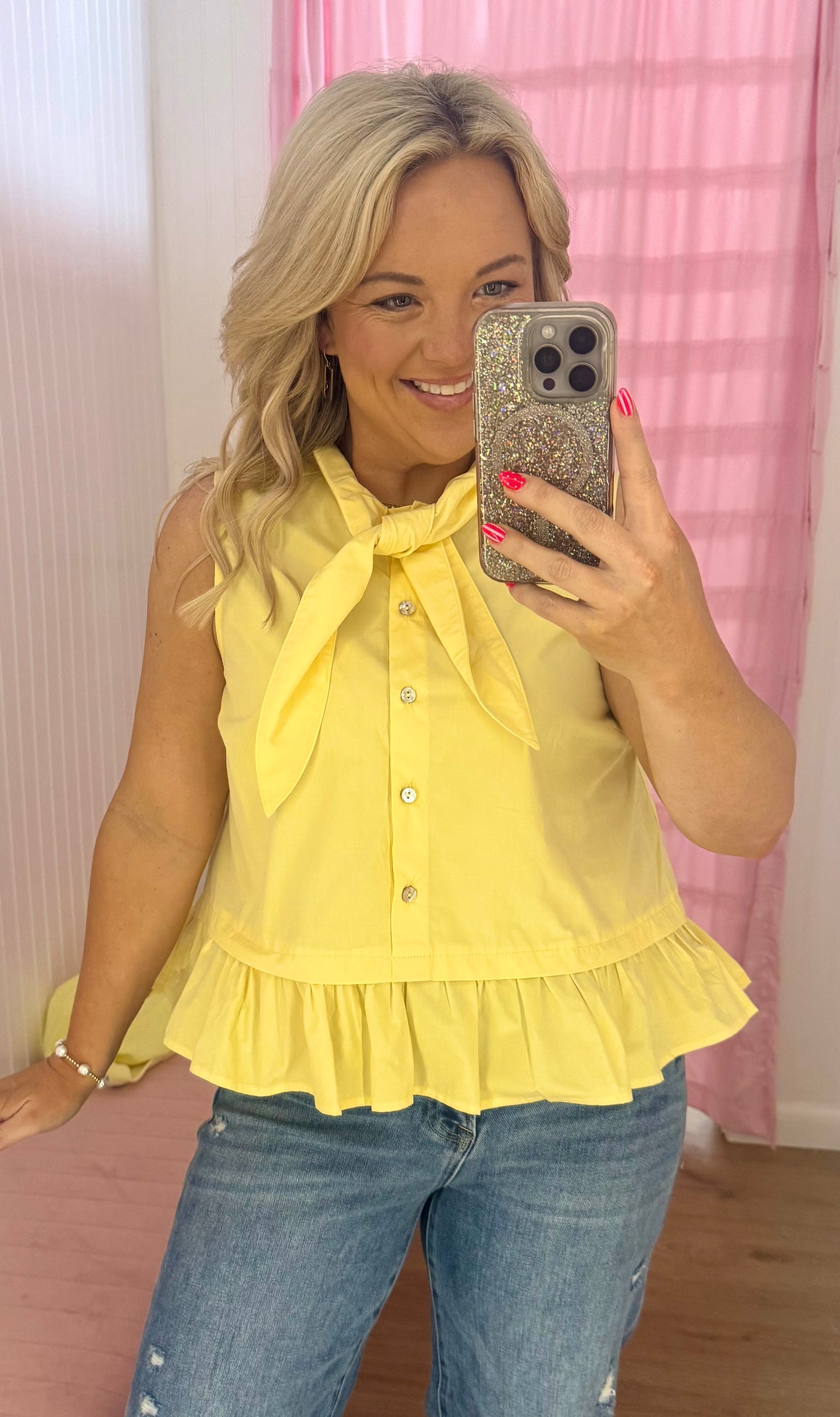 Yellow tie sleeveless blouse