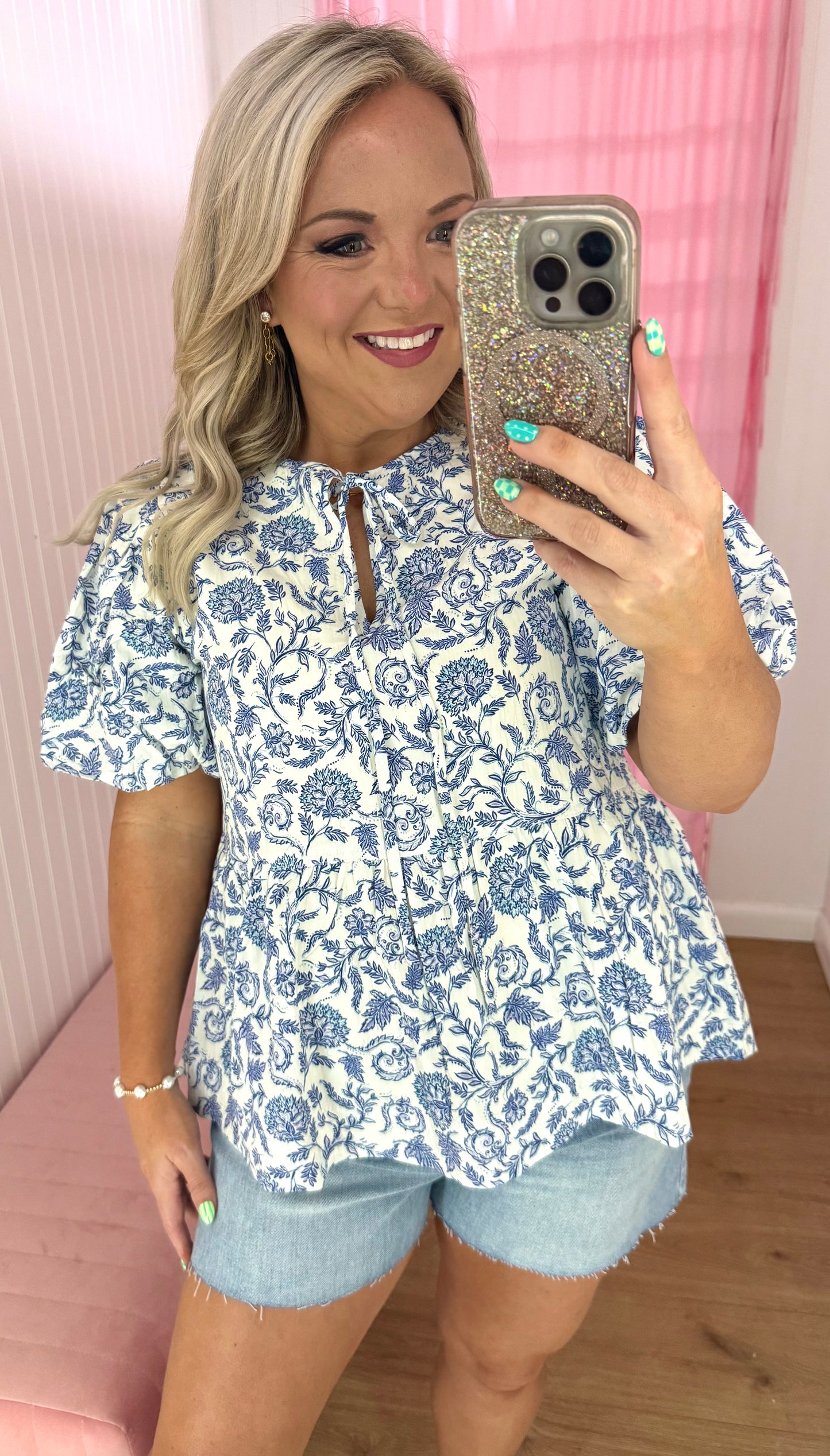 Blue floral split neck blouse