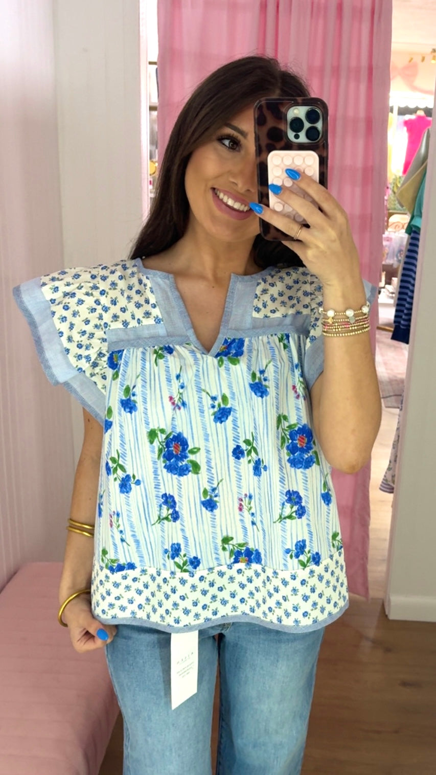 Blue floral flutter sleeve top